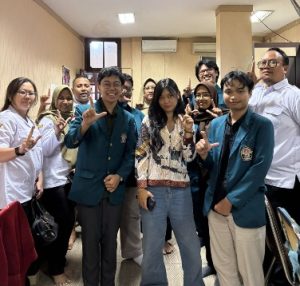 A group of people posing for a photo AI-generated content may be incorrect.